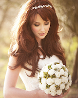 woman_holding_bouqet_97733735